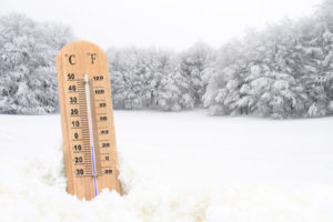 image of thermometer in snow depicting heating degree days