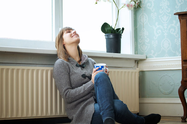 image of a homeowner comfortable with oil heat