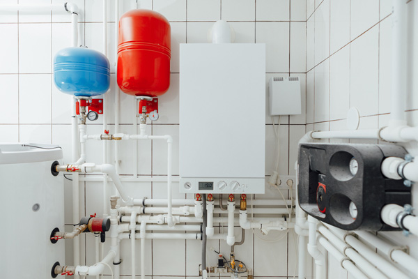 image of an oil water heater in a boiler room