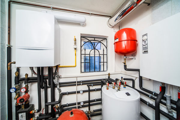 image of a boiler room and vent pipes