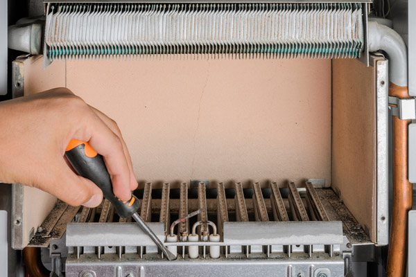 image of an old gas furnace that requires a furnace repair