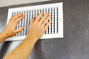 image of an air hvac air vent depicting hvac outdoor unit that is working but does not have airflow