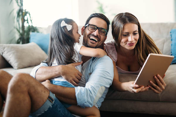 comfortable family depicting the use of a variable-speed air conditioner