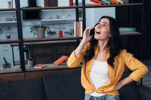 woman on the phone calling hvac